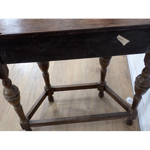 487 - An oak demi-lune Side Table fitted single drawer