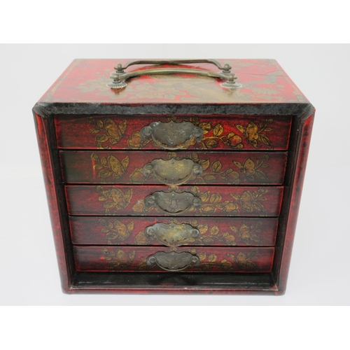 49 - A Mah Jong Set in red lacquered case with slide-up front revealing four drawers, 8in