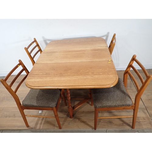 492 - An oak dropleaf Dining Table and four Scandart Dining Chairs