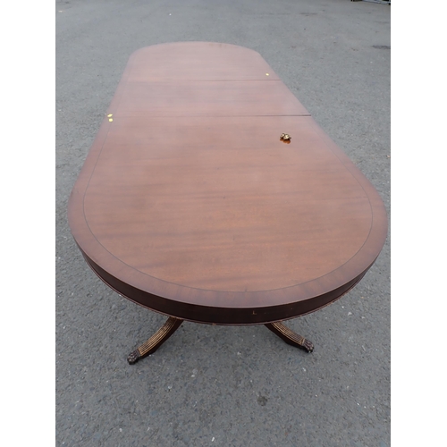 494 - A mahogany veneered twin pedestal extending Dining Table with spare leaf 8ft 5in L x 2ft 5in H, owne... 