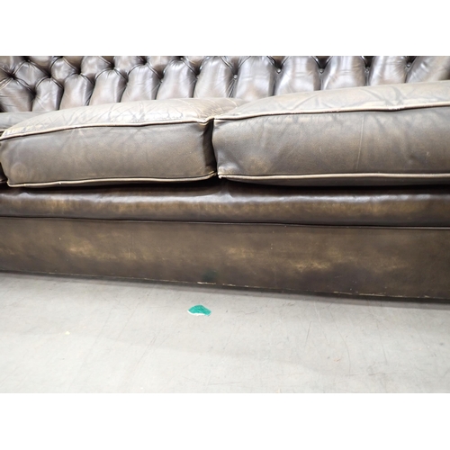 497 - A modern green leather button back Settee 6ft 4 in W, 3ft H, 3ft D, seat height 1ft 6in