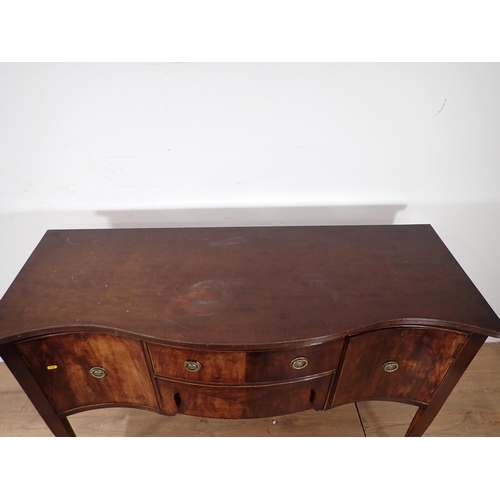 500 - A Georgian style mahogany veneered serpentine fronted Sideboard