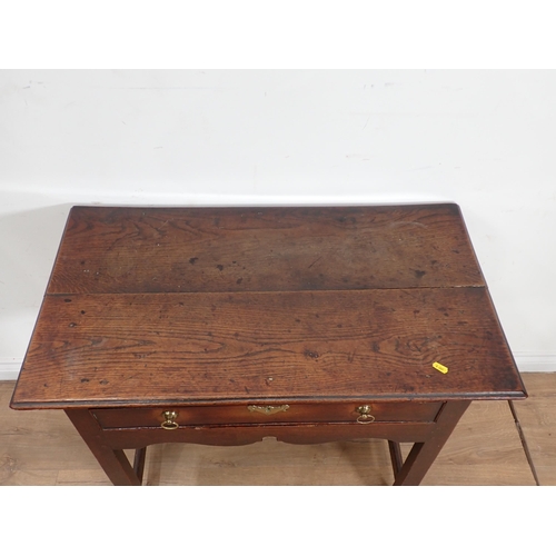 504 - An 18th Century Welsh oak Side Table fitted single frieze drawer above shaped frieze mounted upon sq... 