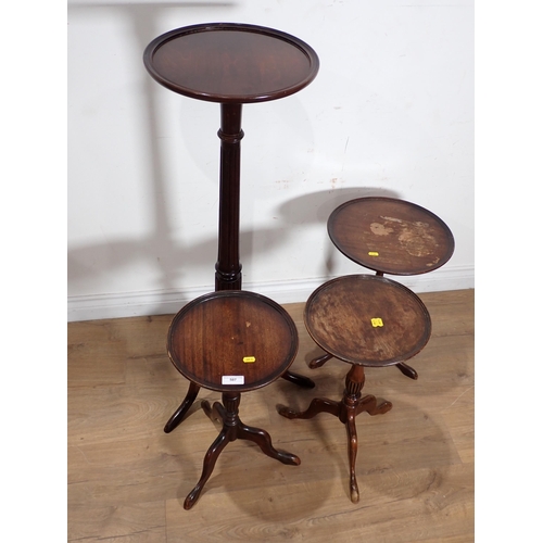 507 - Three reproduction mahogany Wine Tables and a Torchiere Stand