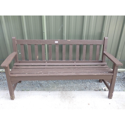 620 - A brown painted wooden Garden Bench