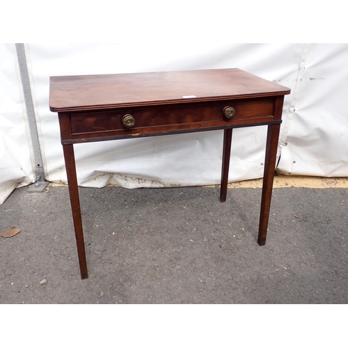 628 - A 19th Century mahogany Side Table with single frieze drawer on square legs and an Overmantle Mirror... 