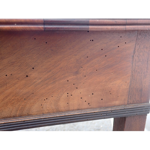 628 - A 19th Century mahogany Side Table with single frieze drawer on square legs and an Overmantle Mirror... 