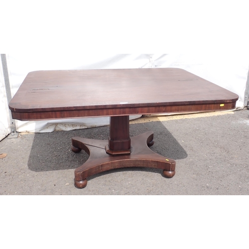 629 - A 19th Century mahogany Breakfast Table with oblong top on square column and concave platform base, ... 