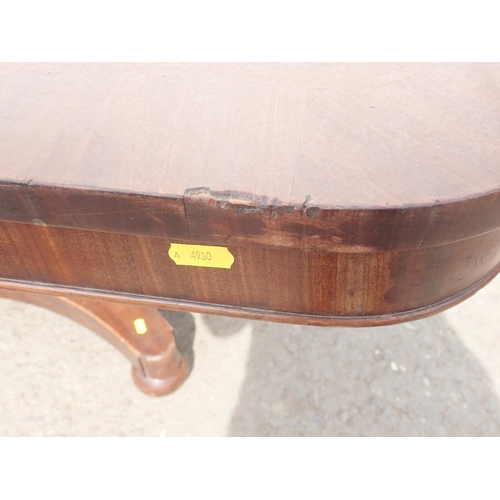 629 - A 19th Century mahogany Breakfast Table with oblong top on square column and concave platform base, ... 