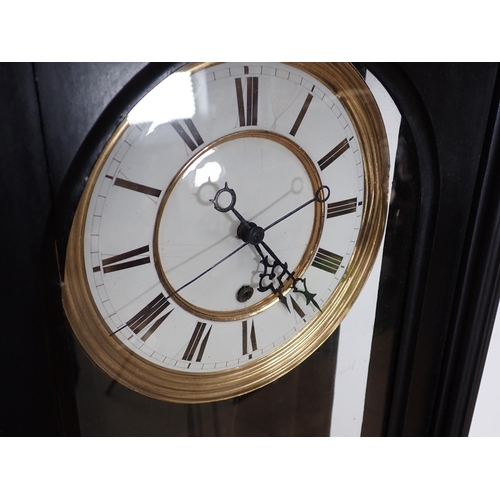 633 - A 19th Century Vienna Wall Clock with white enamel circular dial, single brass cased weight driven m... 