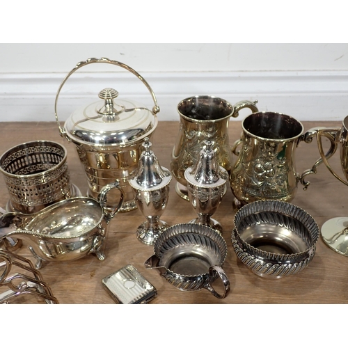 64 - A box of plated ware including Tankards, Cutlery, Toast Rack, etc.