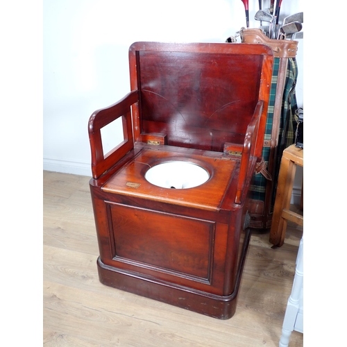 70 - A tin Deeds Box, two stacking Chairs, a set of Golf Clubs, painted Magazine Rack and a mahogany Comm... 