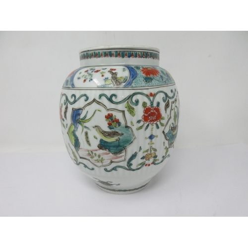 77 - A Chinese polychrome Jar painted birds and flowers, 8in