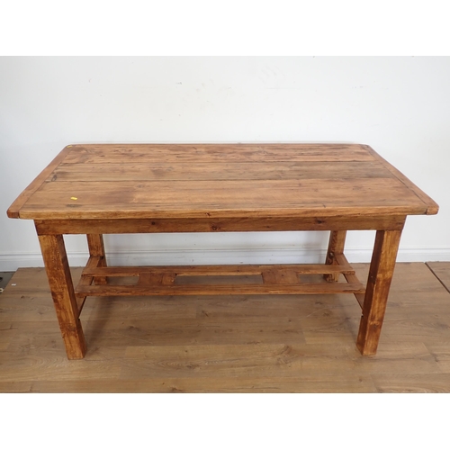 8 - A pine Dining Table with cleated top on squared supports, 5ft L x  2ft 5in W x 2ft 6in H