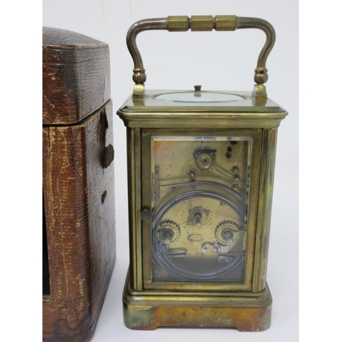 81 - A brass cased Carriage Clock with lever escapement, hour repeater, 6½in, in original case, with key