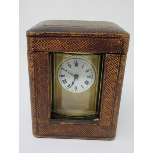 81 - A brass cased Carriage Clock with lever escapement, hour repeater, 6½in, in original case, with key