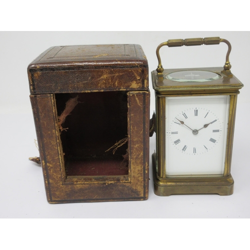 96 - A brass cased Carriage Clock with white enamel dial, lever escapement, 6½in, in case