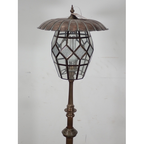 457 - A brass and copper telescopic Standard Lamp with glass shade, passed PAT