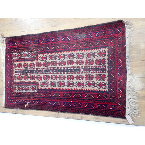 351 - A Persian red ground Rug with two rows of medallions within multiple borders 6ft L x 4ft 4in W and a... 