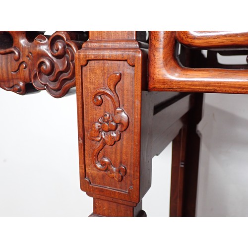 1 - A Chinese hardwood Serving Table with carved and pierced frieze, the squared supports with surface c... 