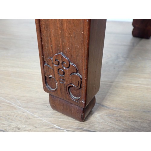 1 - A Chinese hardwood Serving Table with carved and pierced frieze, the squared supports with surface c... 