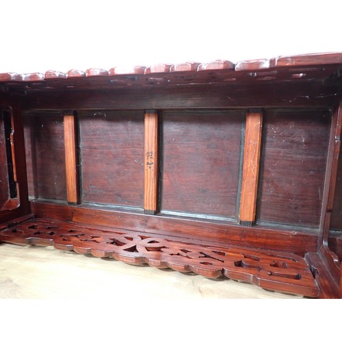 1 - A Chinese hardwood Serving Table with carved and pierced frieze, the squared supports with surface c... 