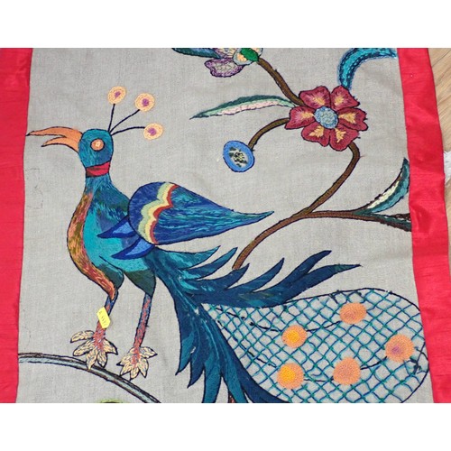 517 - A crewelwork on linen Tree of Life Hanging with a large peacock and flowers Circa 1900. Later red mo... 