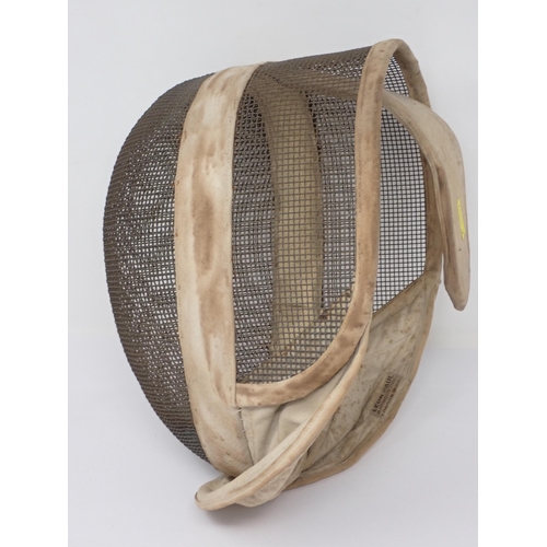 71 - Two early 20th Century Fencing Masks one by Leon Paul, London