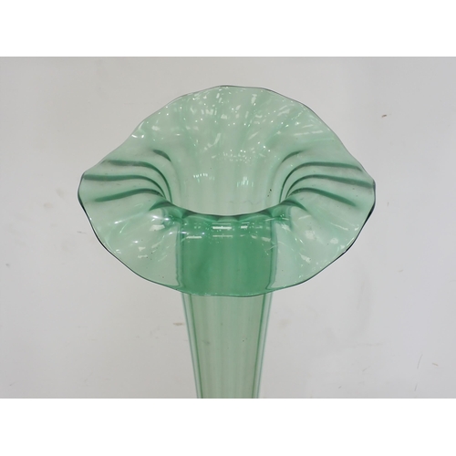 234 - A green glass floor floor standing Vase A/F 4ft H