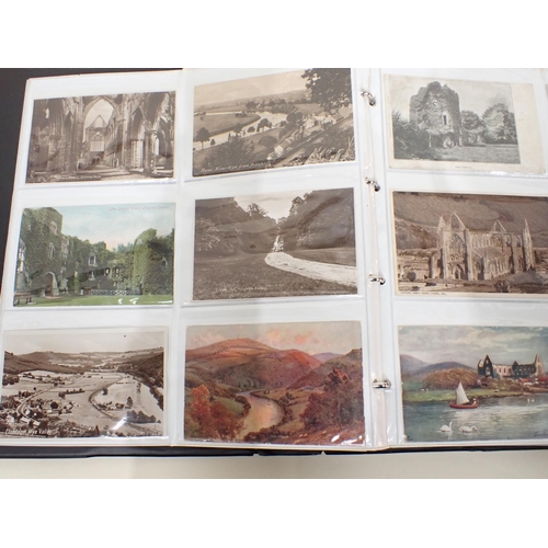 294 - A large brown Album of 192 Monmouth Postcards