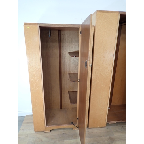 321 - An Art Deco birdseye maple Bedroom suite comprising two Wardrobes