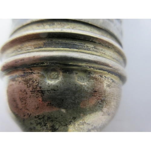 111 - A Continental silver cased Prayer Wheel with floral scroll embossing, crown finial with flowers and ... 