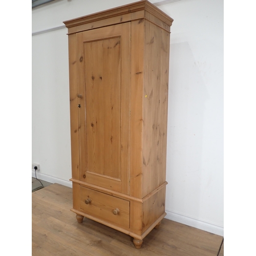 19 - A pine single door Wardrobe fitted single drawer to base 6ft 8in H x 2ft 11in W