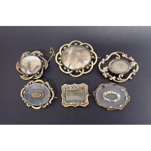 203 - A collection of six Mourning Brooches, five with woven hair enclosed