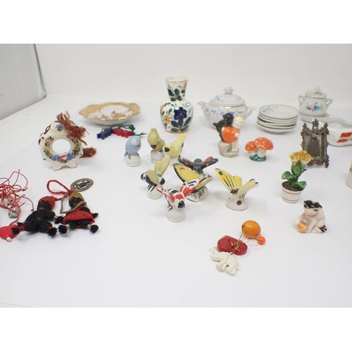 208 - A part Doll's teaset, various small ceramic Insects, Birds etc