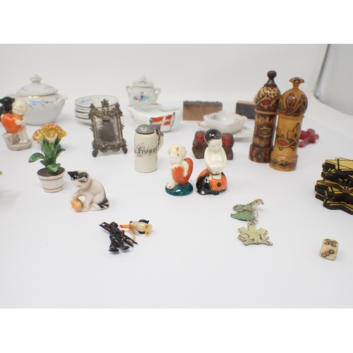 208 - A part Doll's teaset, various small ceramic Insects, Birds etc