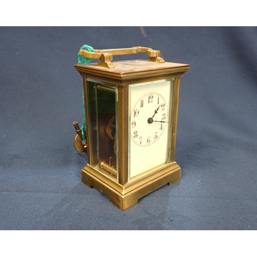 210 - A brass cased Carriage Clock, 4 1/2in high