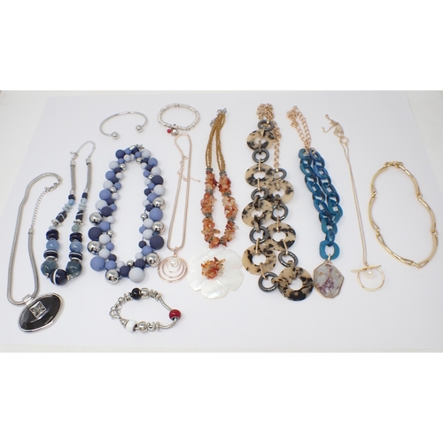 213 - A collection of Costume Jewellery including; chunky necklaces, bangles etc