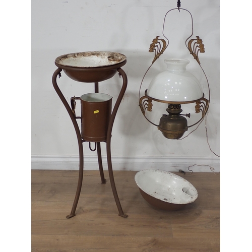 237 - A WWI metal Wash Stand with enamel Jugs and Bowl and a hanging Oil Lamp