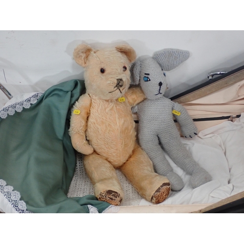 243 - A Pram, a Teddy Bear and another Soft Toy