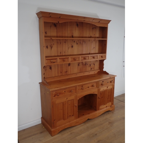 249 - A modern pine Kitchen Dresser and Rack fitted three frieze drawers above pair of cupboard doors 6ft ... 