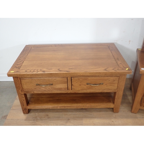 251 - A modern oak veneered Coffee Table, Nest of three Occasional Tables and a two door Cupboard