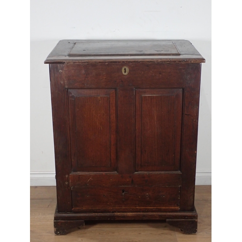 261 - An antique oak set of enclosed shelving with panelled front 3ft 3in H x 2ft 7in W