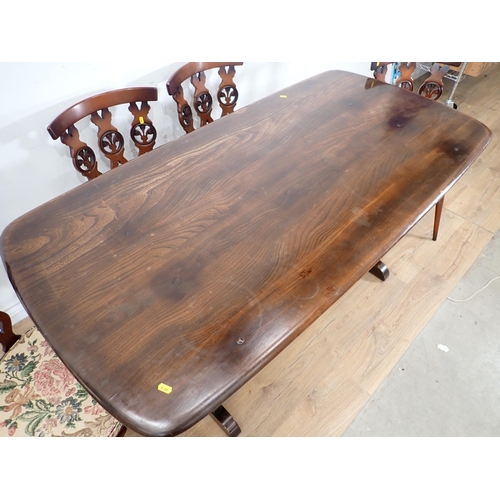 263 - An Ercol Refectory Table 5ft W x 2ft 4in H and four wheelback Chairs