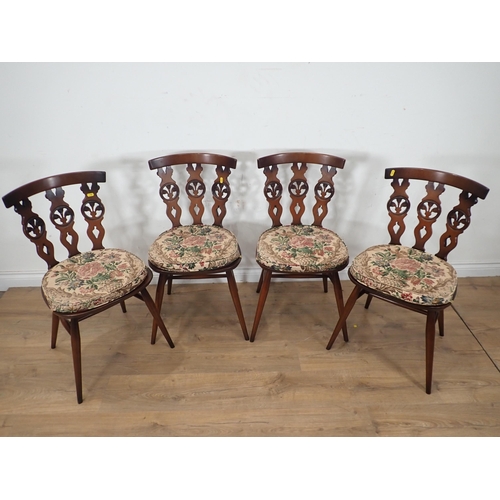 263 - An Ercol Refectory Table 5ft W x 2ft 4in H and four wheelback Chairs