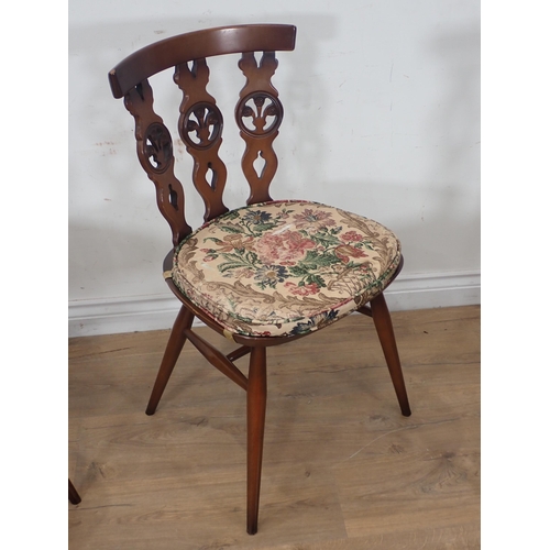 263 - An Ercol Refectory Table 5ft W x 2ft 4in H and four wheelback Chairs