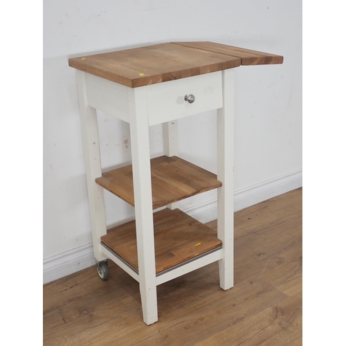 268 - A white painted beechwood dropleaf three tier Butcher's Block