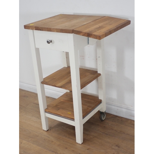 268 - A white painted beechwood dropleaf three tier Butcher's Block