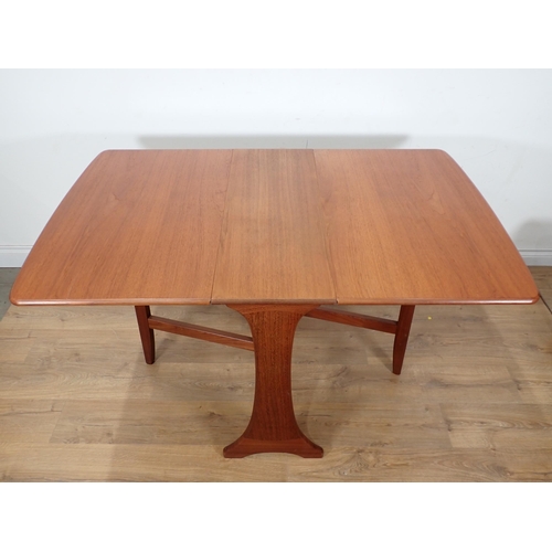 269 - A G-Plan dropleaf Dining Table and four Chairs