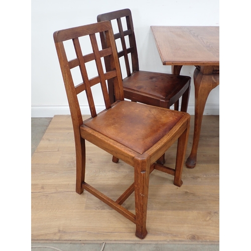 289 - An oak veneered fold over Dining Table and four Chairs